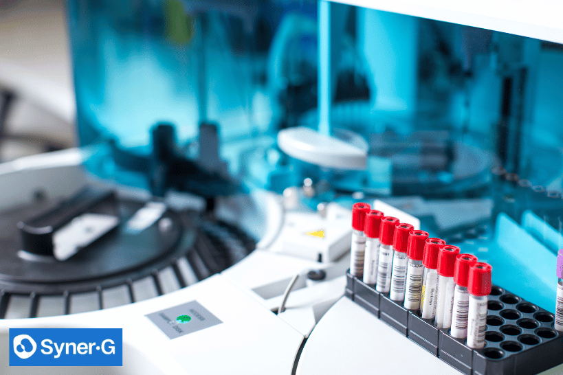 Drug development laboratory with test tubes and centrifuge for IND research.