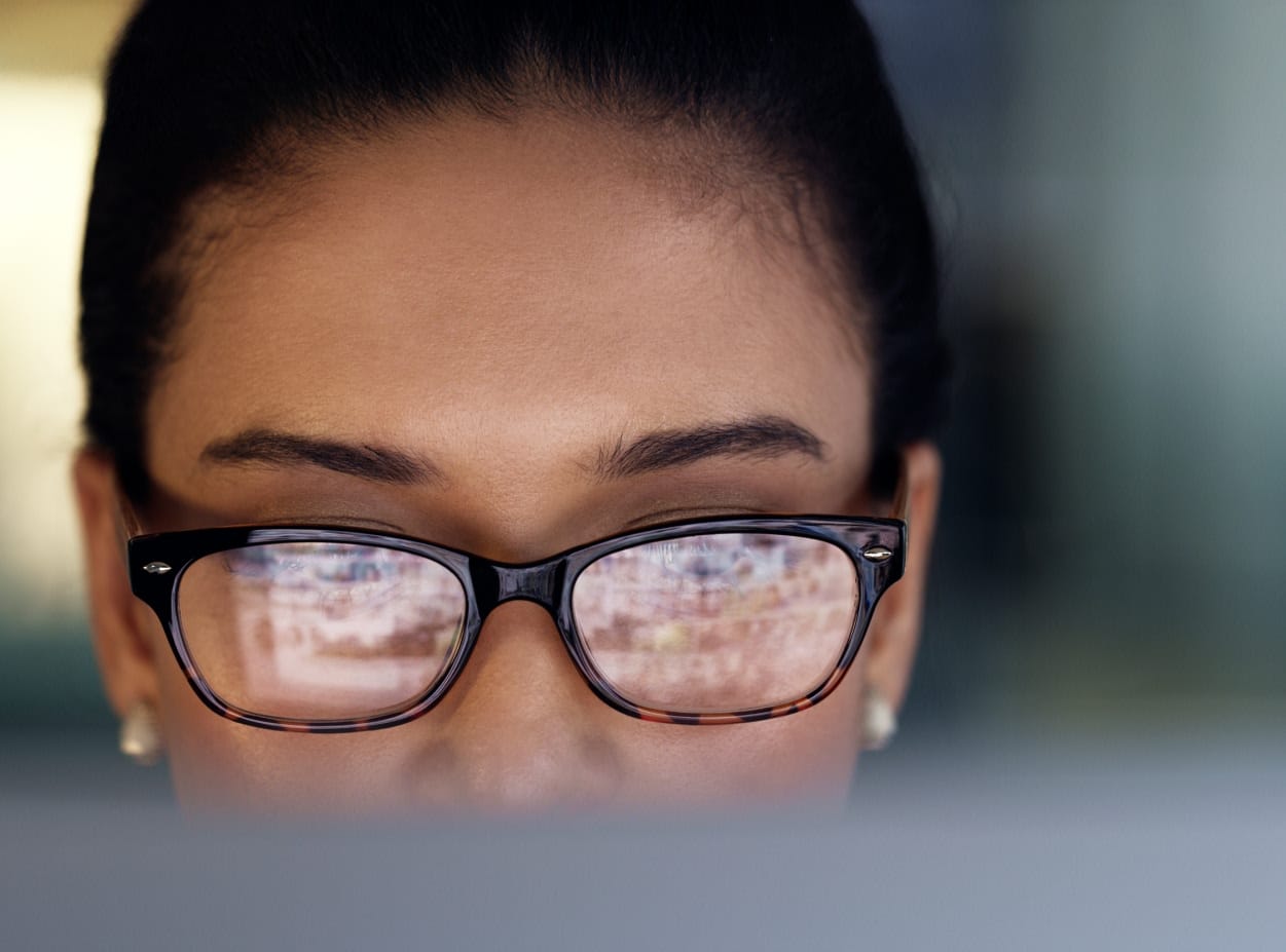 Medical writer reviewing digital content for accurate and compliant regulatory documents.