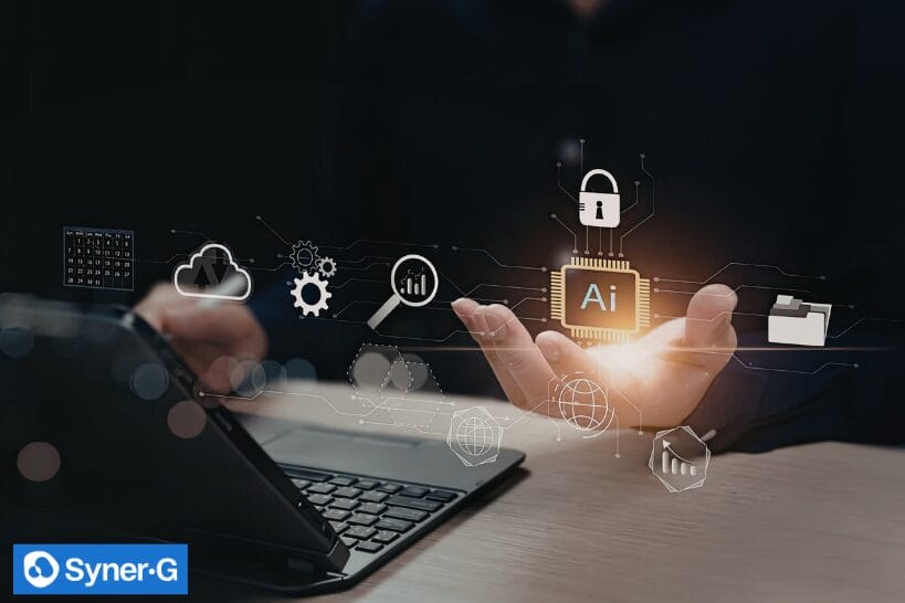 Hand holding a glowing AI chip icon above a laptop with cybersecurity and cloud symbols overlay, representing secure AI and data protection.