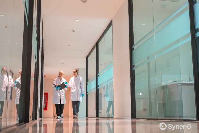 Biopharma professionals conducting an on-site CDMO audit to assess operational readiness.