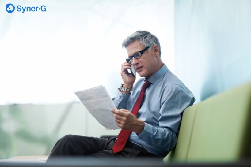 Biopharma professional reviewing a potential CDMO partner while weighing contracting delays and data integrity concerns.