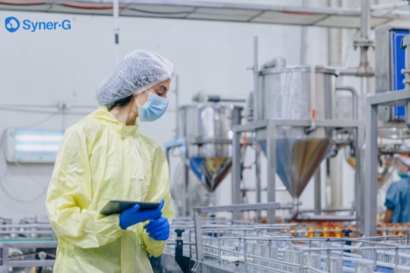 Biopharma technician executing qualification batches using the final facility and manufacturing configuration.