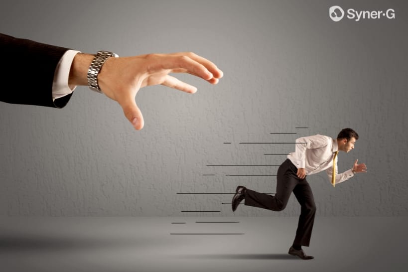 Business professional running away, representing warning signs that it may be time to walk away from a CDMO partnership.